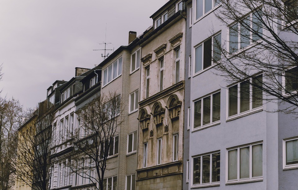 European urban streetscape with mixed traditional and modern facades